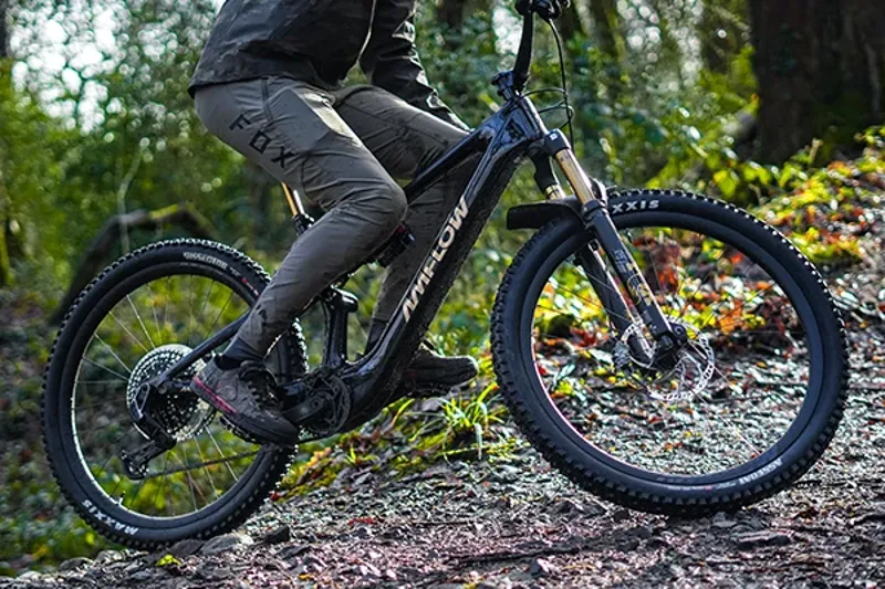 Electric mountain bike climbing a steep mountain trail