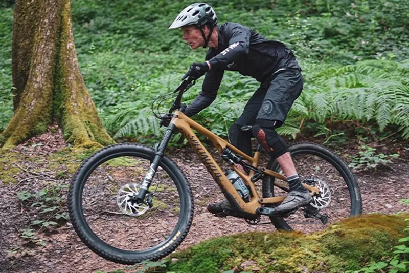 Riding an Orbea Occam LT Full suspension mountain bike on a rocky trail