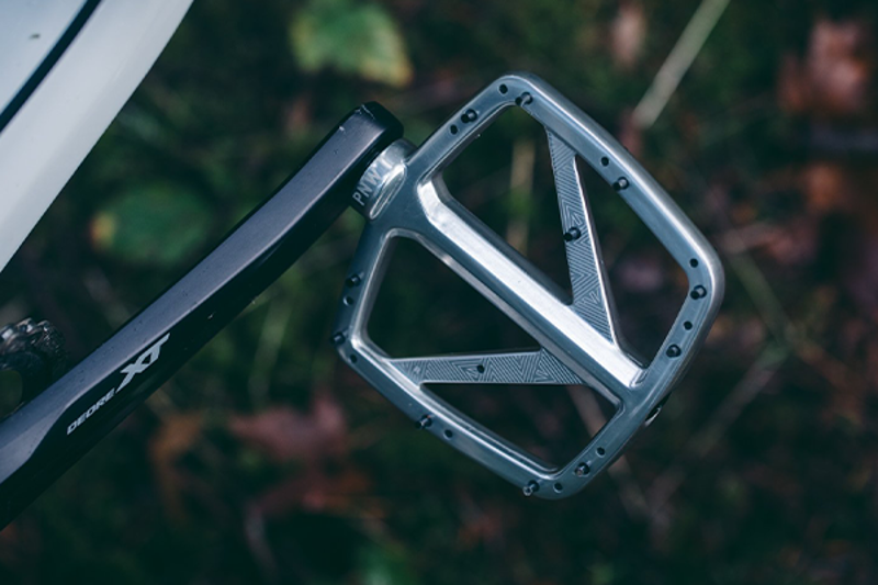 PNW Flat mountain bike pedal on a trail bike