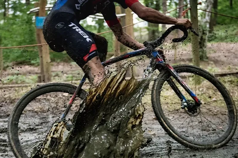 Trek cyclocross bike muddy puddle spash Race