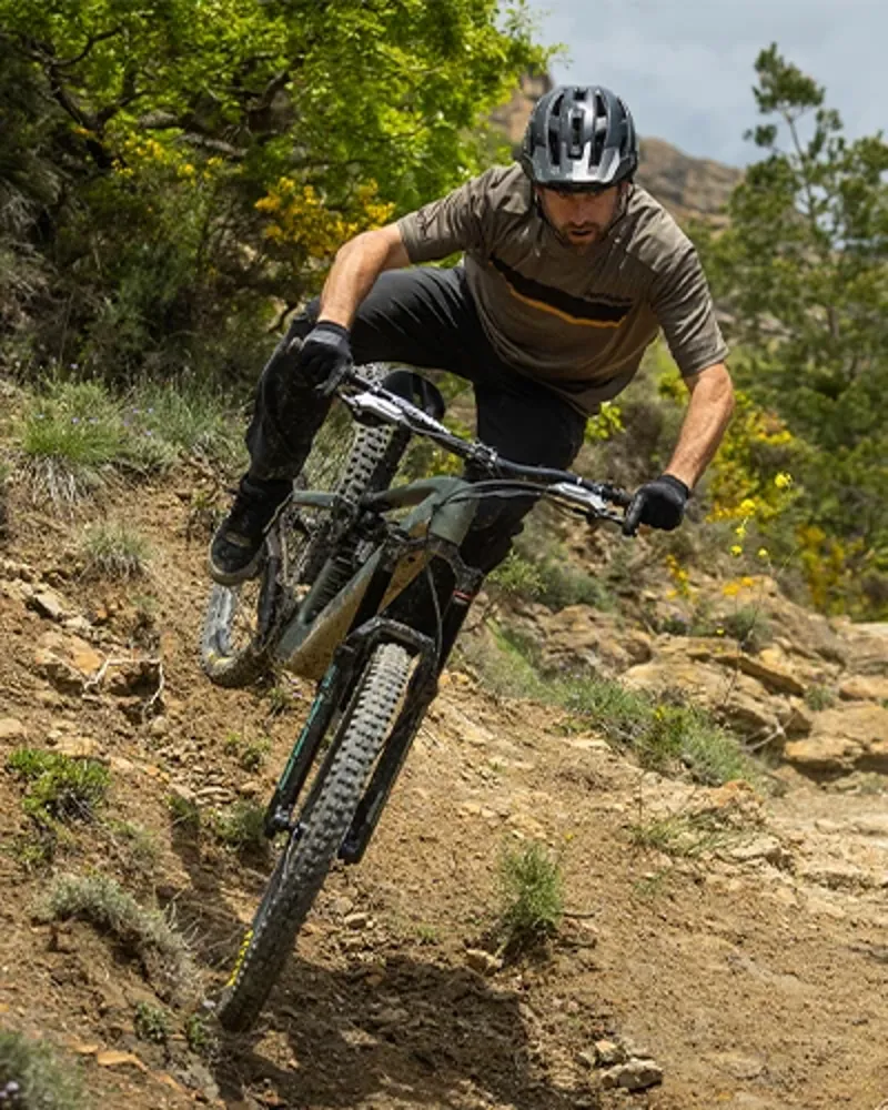 Riding the Trek Fuel+ LX long travel bike on rocky trails